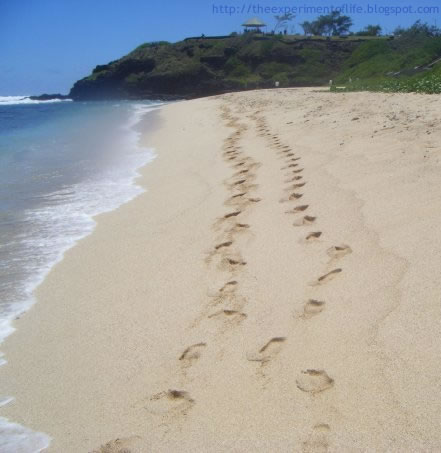 sand footprints on the beach at Gris Gris, Mauritius
