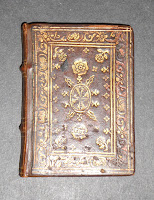 A leather-bound book with gold stamping.
