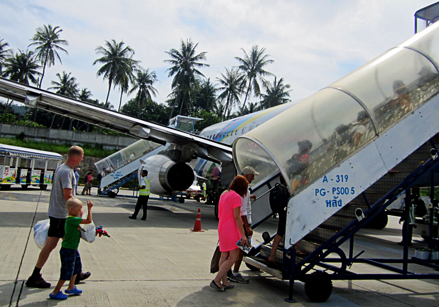 Stock Pictures Aircraft boarding staircase or Airstair with people
