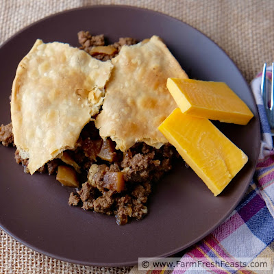 Ground beef and sautéed turnips topped with pie crust and baked in a skillet. Hearty comfort food from the farm share.
