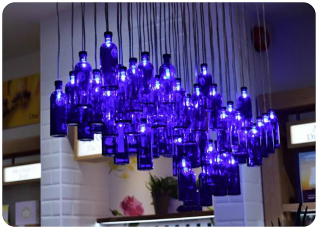 blue bottle light feature at Neal's Yard, Manchester