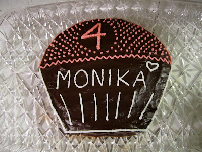 decorated birthday cake shaped like cupcake