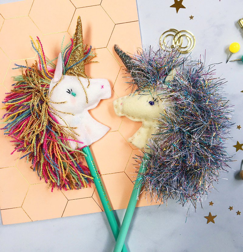 DIY Unicorn Felt Topper - this adorable craft is perfect for kids! Decorate your birthday party cupcakes or school pencils with these fun unicorns! via BirdsParty.com @birdsparty