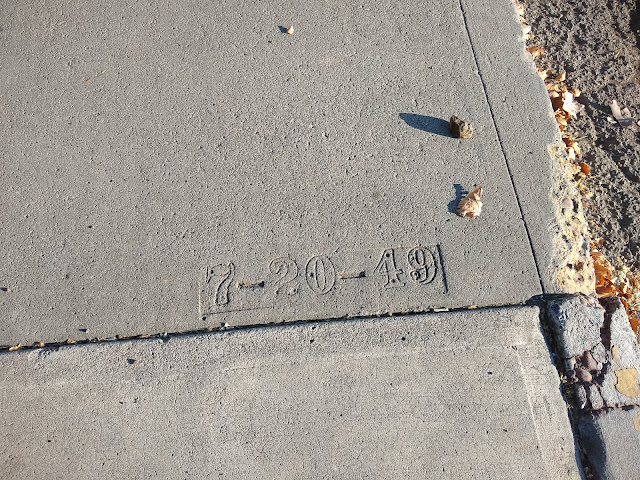 Date on sidewalk in the park