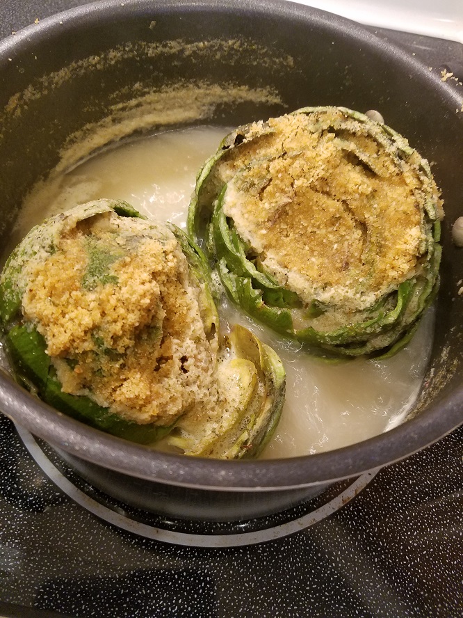 These are homemade stuffed artichokes with Italian bread crumbs, cheese and garlic. They are cleaned boiled and stuffed