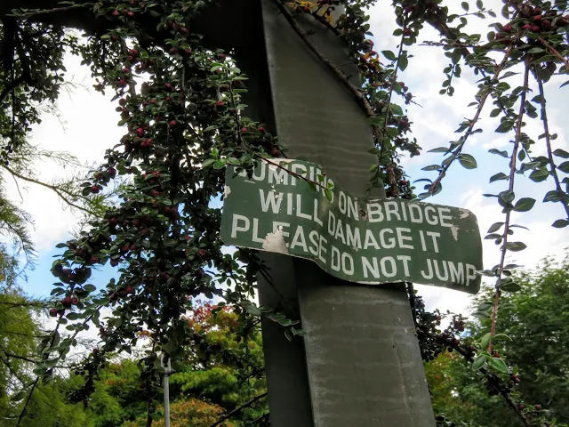 Warnng sign on the suspension bridge in Mount Usher Gardens in County Wicklow