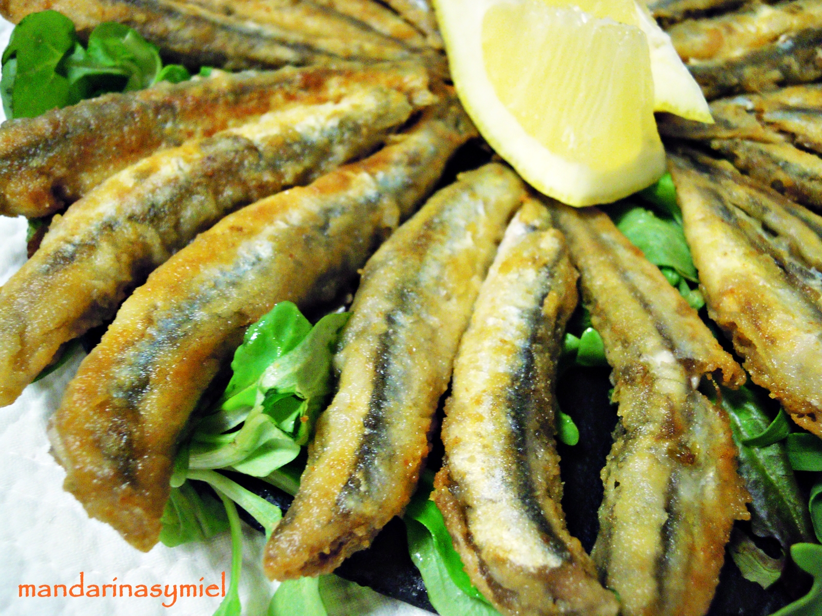 Boquerones fritos adobados Mandarinas y miel