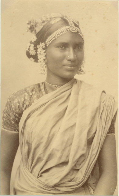 Portrait of an Indian Woman. Her Hair Decorated with Flowers and Ornaments - c1880