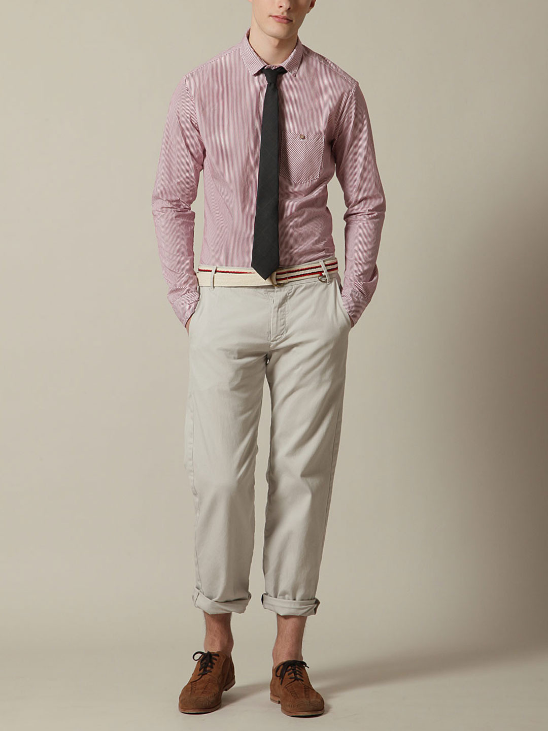 What to wear: Pink shirt, khakis, black tie, brown shoes, grosgrain belt