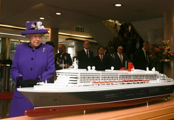 Britain's Queen Elizabeth II visited the International Maritime Organization (IMO) in London