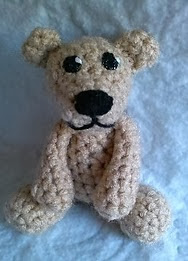 http://www.ravelry.com/patterns/library/berry-the-tiny-bear