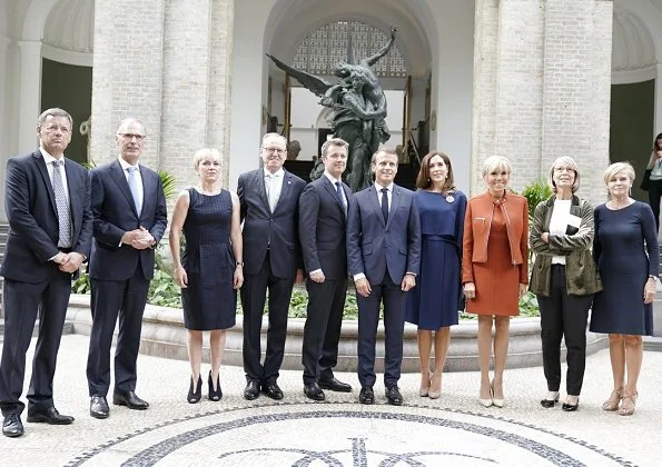 Brigitte Macron wore a dress by Louis Vuitton. Crown Princess Mary wore Stella McCartney cape gown. President Emmanuel Macron