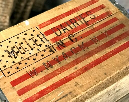 Antique crate with flag stencil