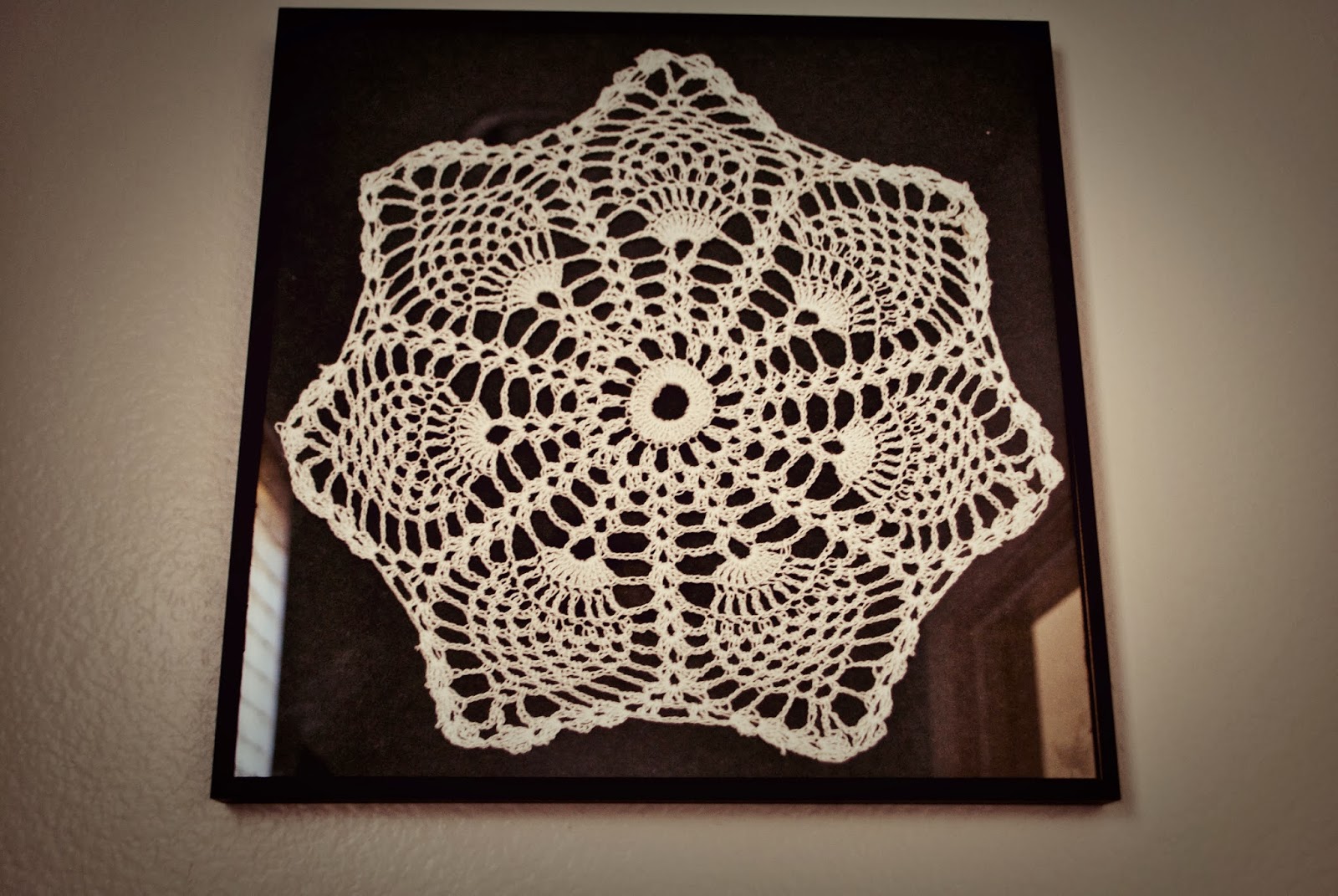 Framed crochet doilies wall art