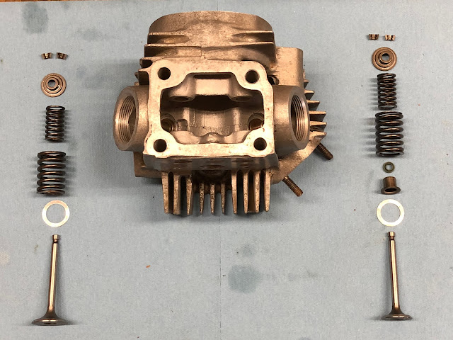 Detail breakdown of a CT90 cylinder head valves and springs