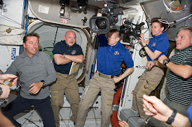 Vittori, left, with some of his fellow crew members after the Endeavour arrived at the International Space Station