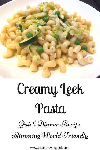 creamy leek pasta in a bowl with text overlay