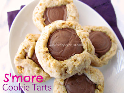 overhead shot of cookies with chocolate center on white plate with words