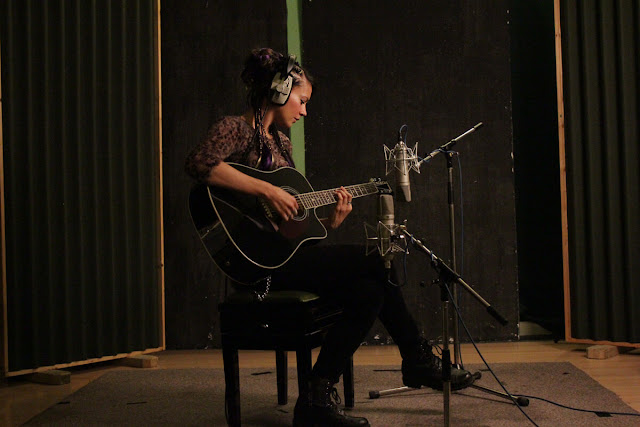 Anna-Christina from Lilygun recording acoustic guitar