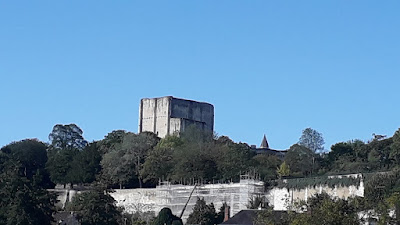 Looking up to the dunjon at Loches from the public gardens