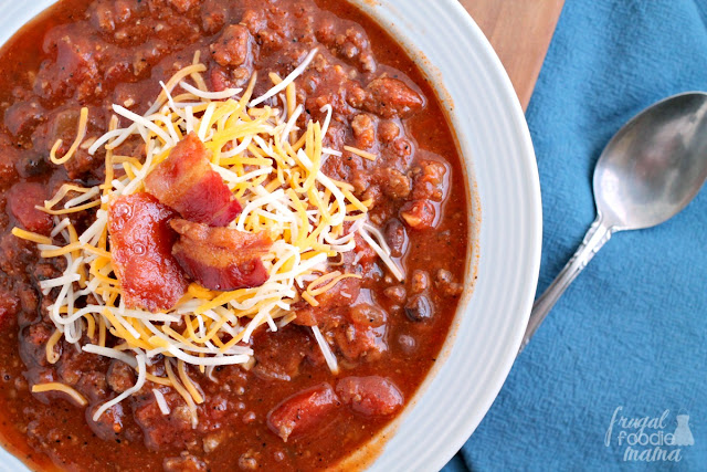 This hearty & comforting homemade chili recipe has two unexpected ingredients in it- ground venison & smoky, thick cut bacon.
