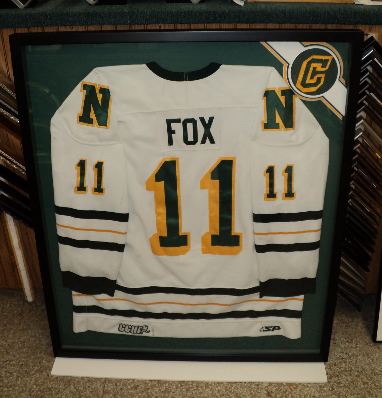 The UP's most creative frame shop Framing NMU hockey jersey