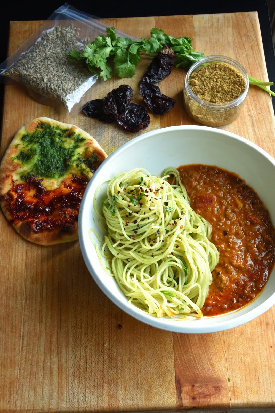 Madrasspiced coconut milk and Kashmiri chili Bolognese