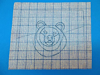 Bear outlined on canvas