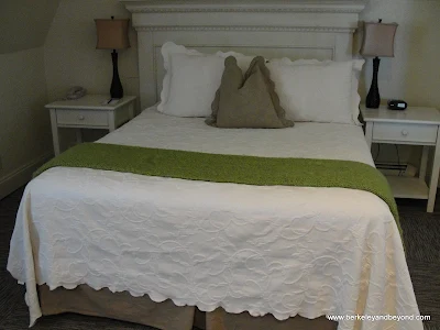 guest room bed at Hotel Carter in Eureka, California