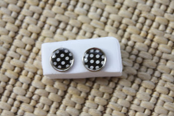 silver rimmed black with white big dots