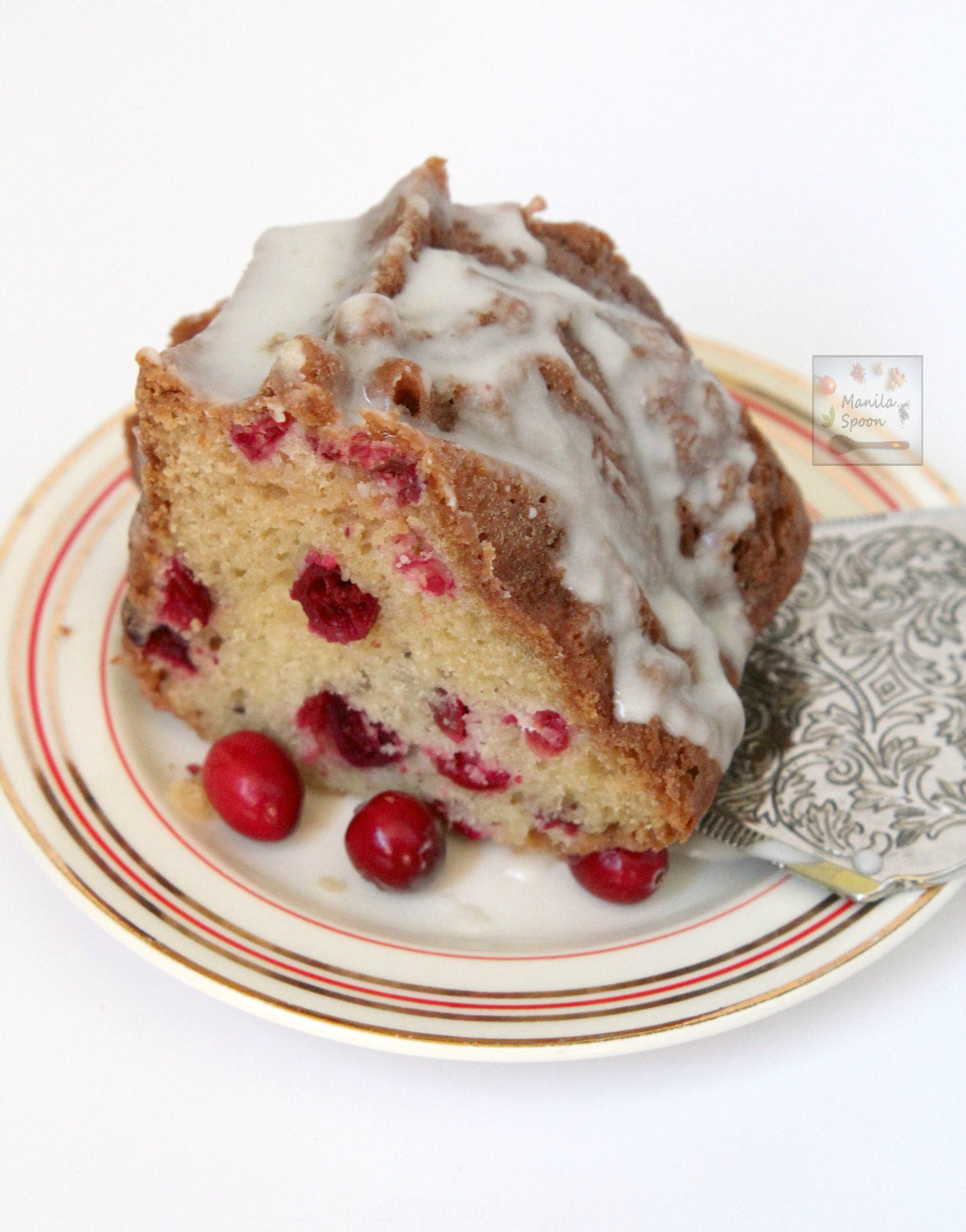 Use fresh, frozen or dried cranberries to make this moist and delicious White Chocolate Cranberry Coffee Cake. Perfect to serve for tea time as well. | manilaspoon.com