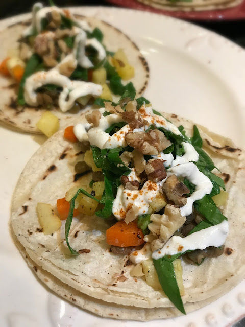 Lentil Tacos with Roasted Root Vegetables, Lightly Dressed Spinach, and Feta-Yogurt Sauce