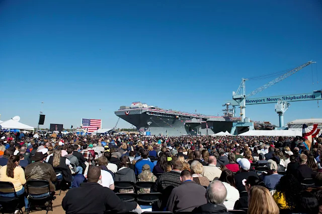 FILE PHOTO: Tens of thousands of Navy supporters attend the christening ceremony of the aircraft carrier Gerald R. Ford (CVN 78) at Newport News Shipbuilding in Newport News, Virginia, U.S. November 9, 2013.  U.S. Navy/Chief Mass Communication Specialist Peter D. Lawlor/Handout via REUTERS/File Photo