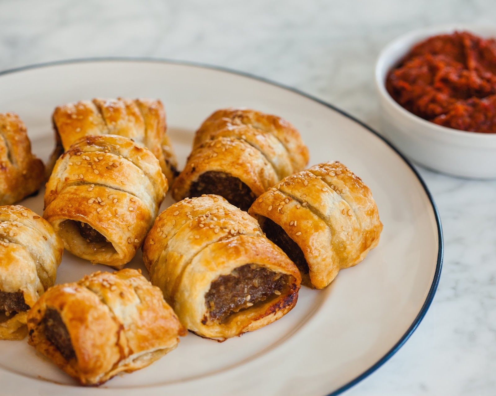 Sausage rolls with caramelized onion and tomato sauce Dreaming of Winter