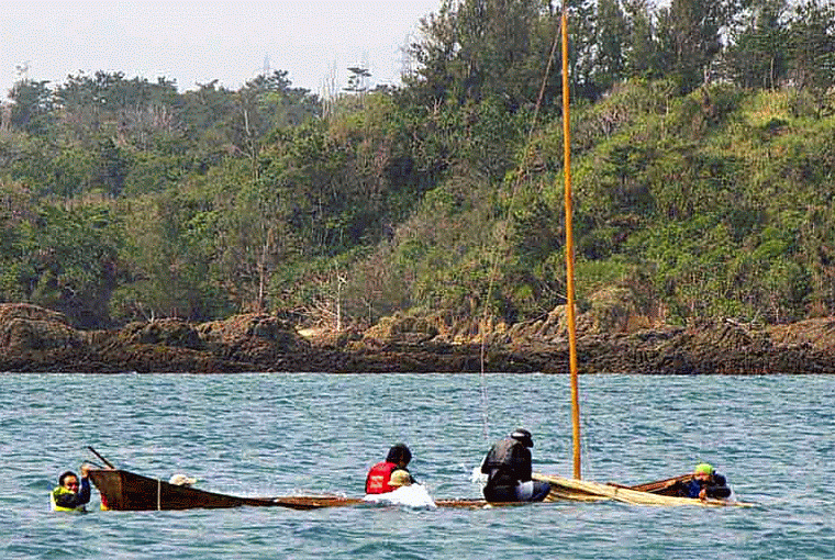 bailing capsized sabani boat