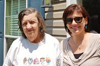 Phyllis Kelly outside her new home with Stacey Epperson