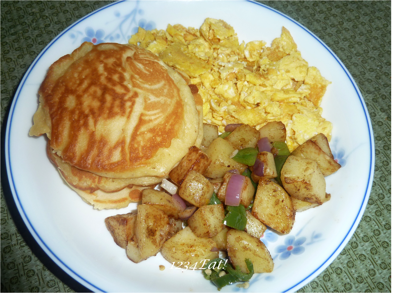 1234Eat! Pancakes, Scrambled Eggs, Home Fries, and Fruit Salad