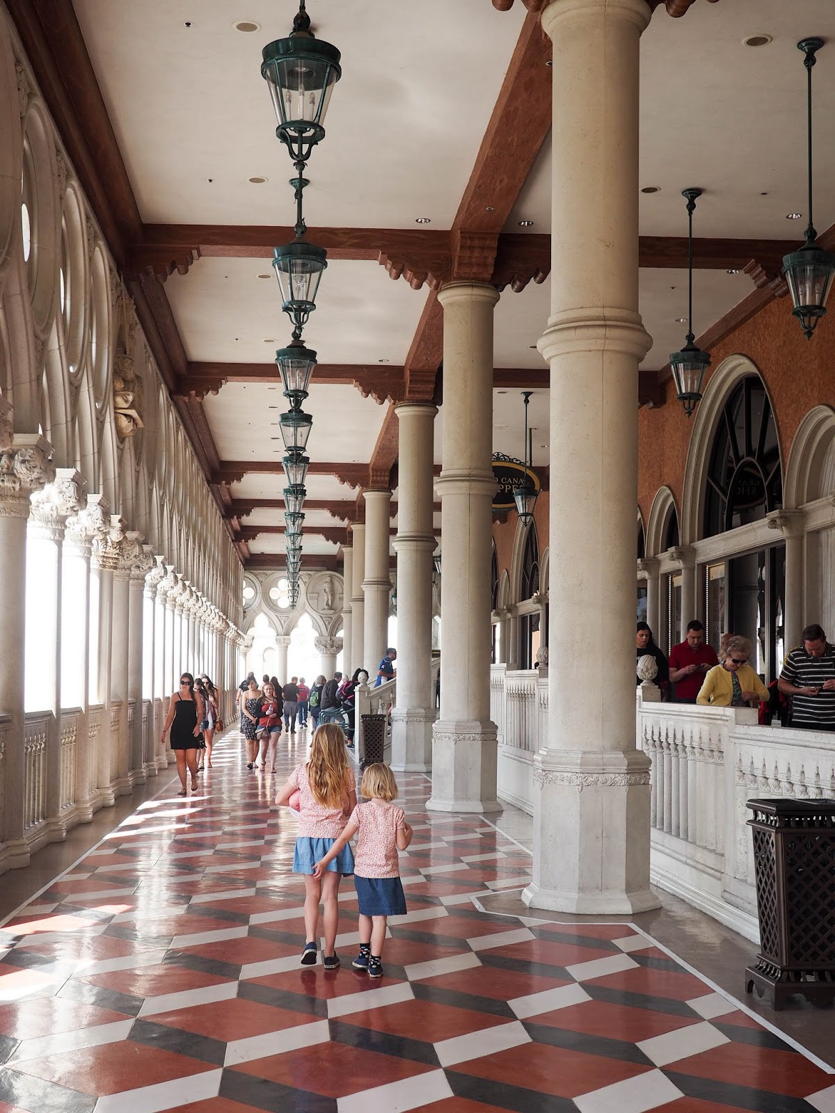 There was a fun cupcake mural next to Sprinkles so we went