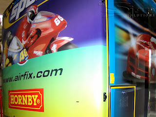 Photograph of Hornby lorry with full colour printed graphics being applied to the back of the lorry.