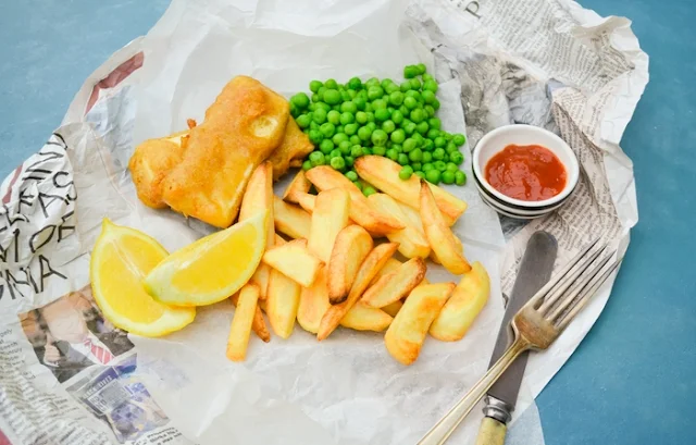 Chip Shop Battered Tofu with chips and peas in chip shop paper