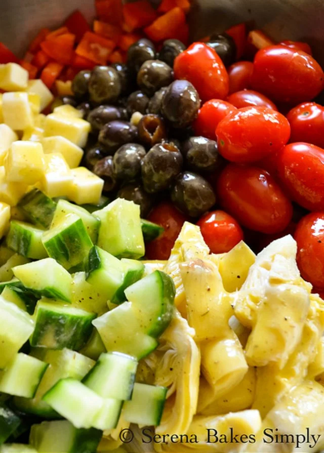 Cold Italian Tortellini Pasta Salad drizzle with dressing from Serena Bakes Simply From Scratch.