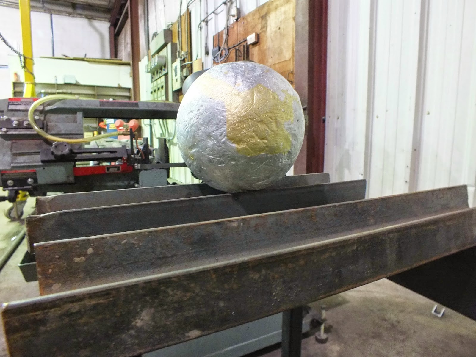 World Of Technology Cigarette Foil Ball, Cut in Half