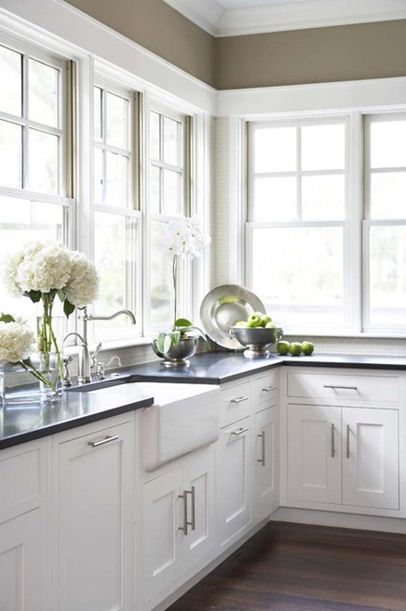 soapstone counters black windows lining counters corner kitchen view 