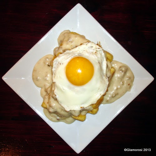 Sausage Gravy and Cornbread Waffle with Fried Egg at Chhaya Café
