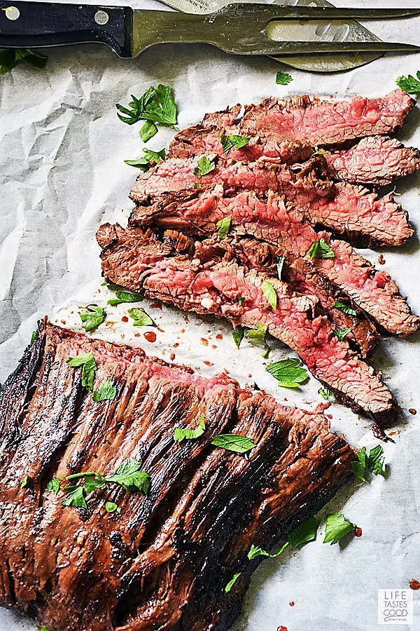 Slice cast iron flank steak thinly across the grain for maximum tenderness