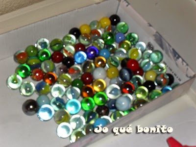 Portavelas con canicas