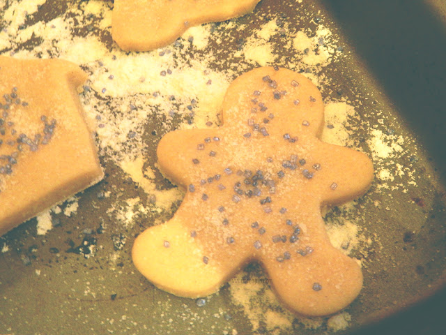 Cookie dough cut into a gingerbread man shape