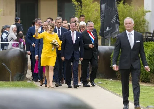 Luxembourg 2019 National Day celebrations. Grand Duke Henri and Grand Duchess Maria Teresa. Asos dress with bow sleeve in yellow