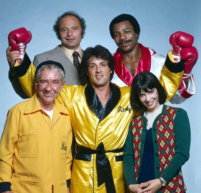 Sylvester Stallone with the crew of Rocky II, 1978