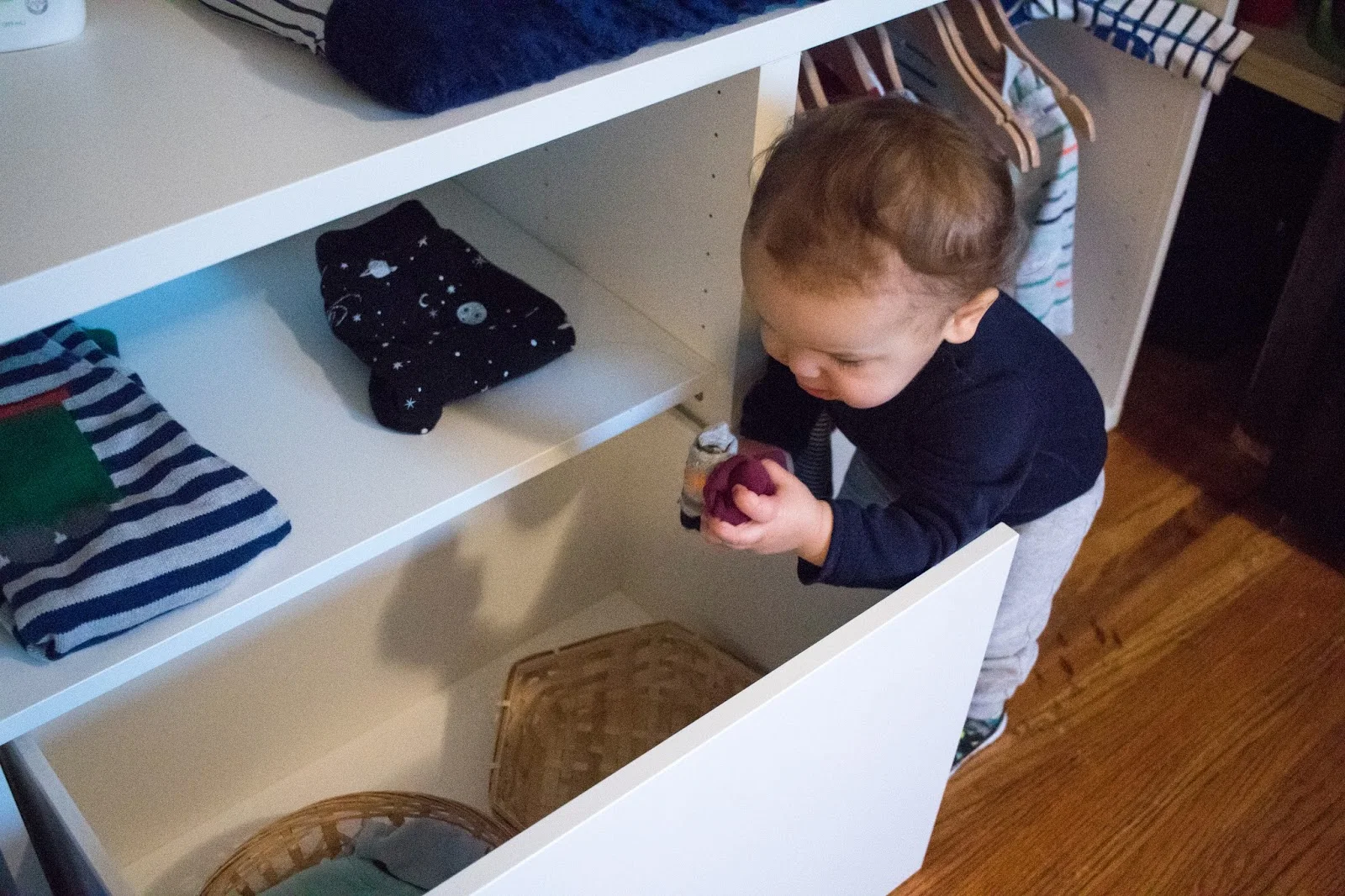 A DIY Montessori toddler wardrobe made with IKEA BESTA shelving 
